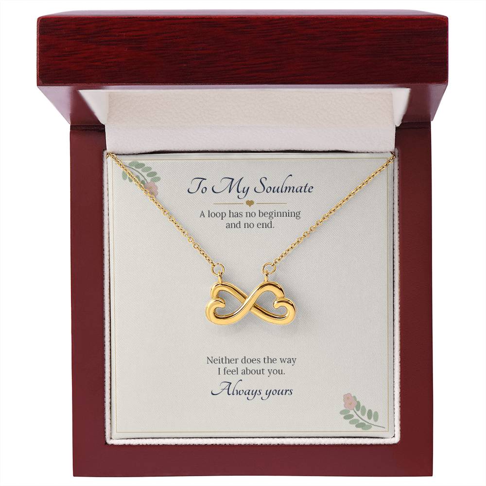 Yellow gold finish infinity heart necklace on the To My Soulmate card inside an open wooden luxury box