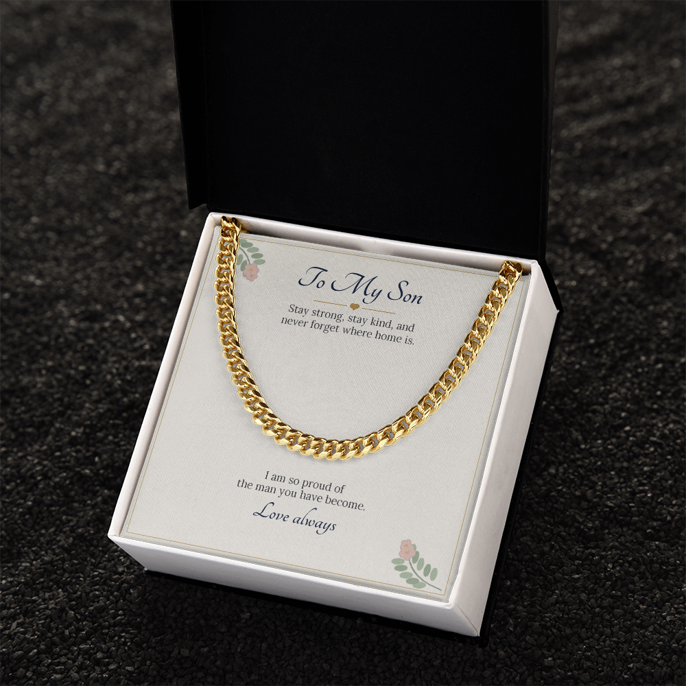 Yellow gold finish Cuban link chain on the To My Son card in a white gift box on dark stone