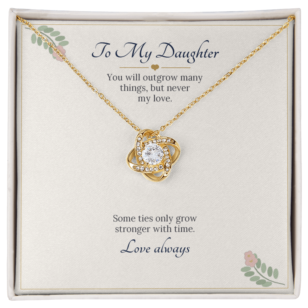 Love knot necklace in yellow gold finish on a cream To My Daughter message card