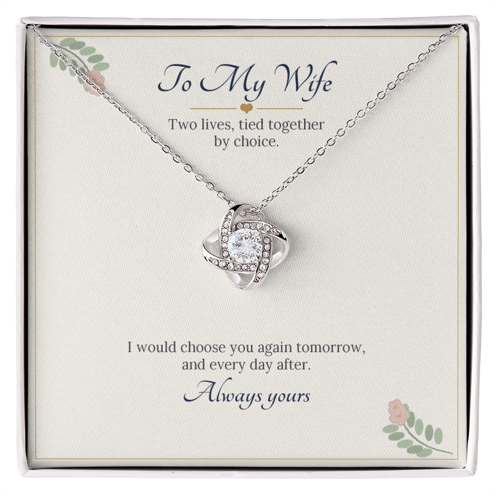 Love knot necklace in white gold finish on a cream To My Wife message card