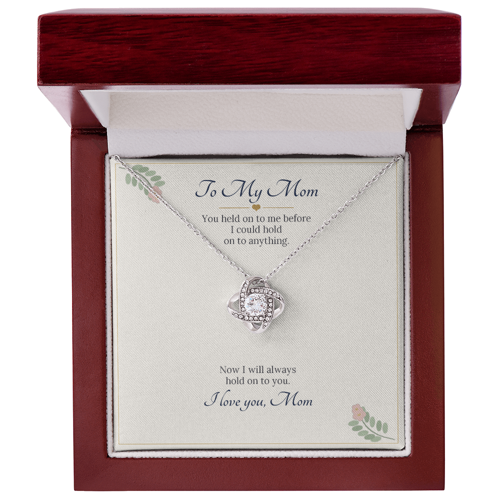 White gold finish love knot necklace on the To My Mom card inside a wooden luxury box