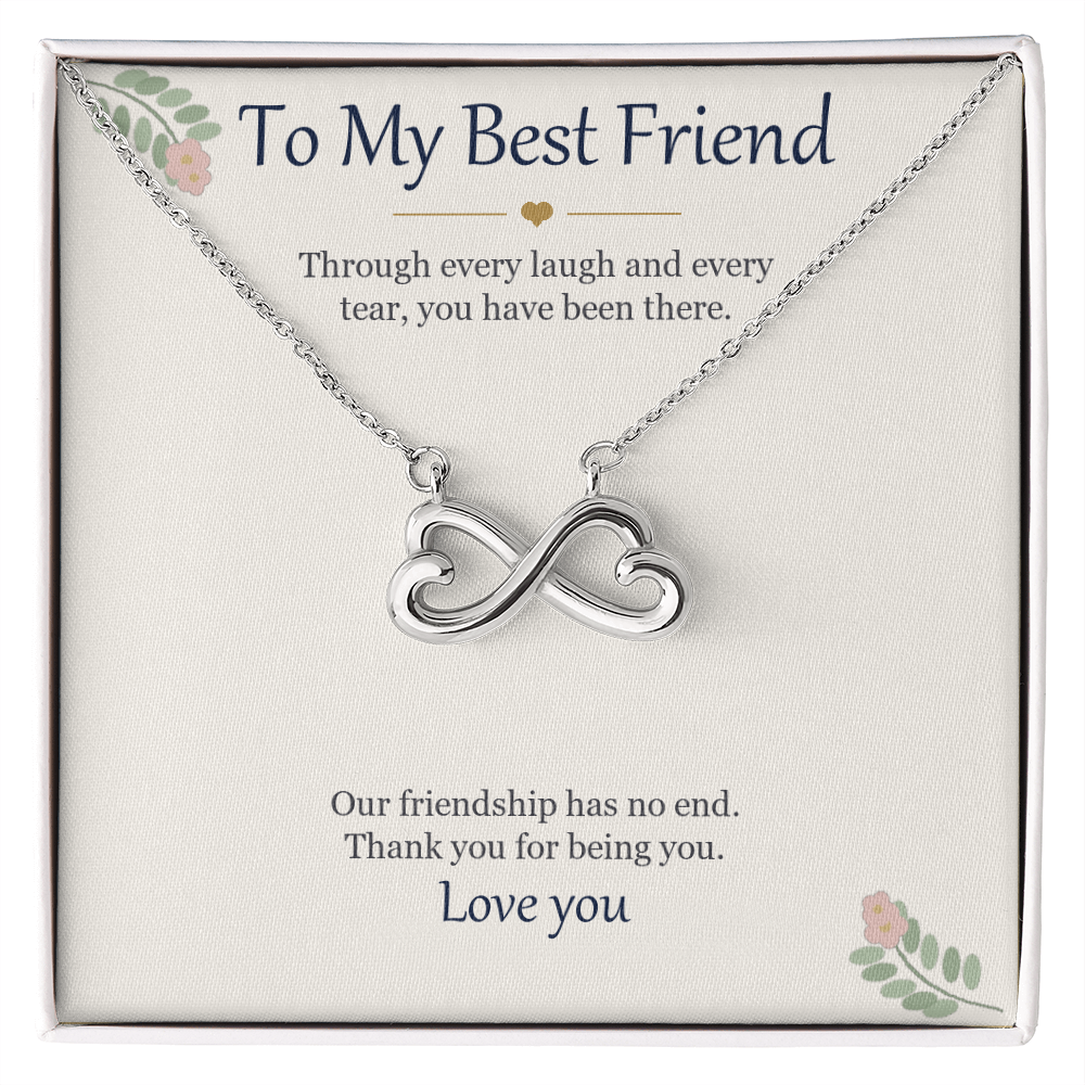 Infinity heart necklace in white gold finish on a cream To My Best Friend message card