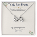 Infinity heart necklace in white gold finish on a cream To My Best Friend message card