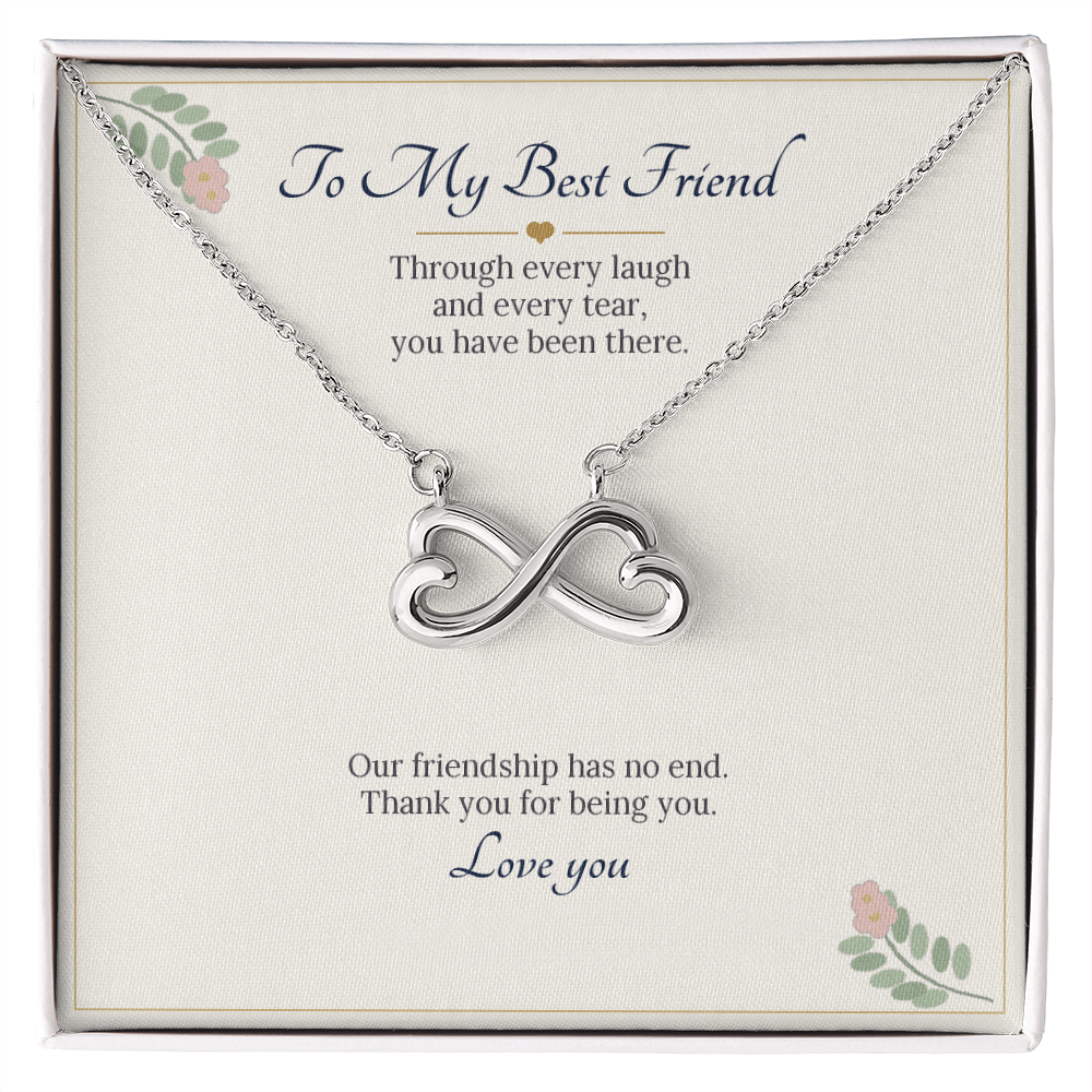 Infinity heart necklace in white gold finish on a cream To My Best Friend message card