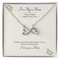 Infinity heart necklace in white gold finish on a cream To My Mom wedding message card, a gift for the mother of the groom