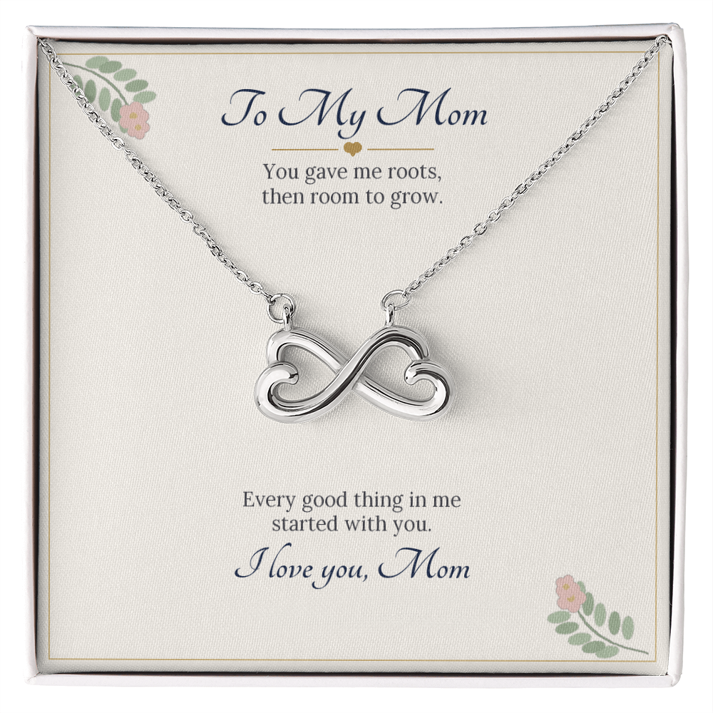 Infinity heart necklace in white gold finish on a cream To My Mom message card