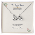 Infinity heart necklace in white gold finish on a cream To My Mom message card