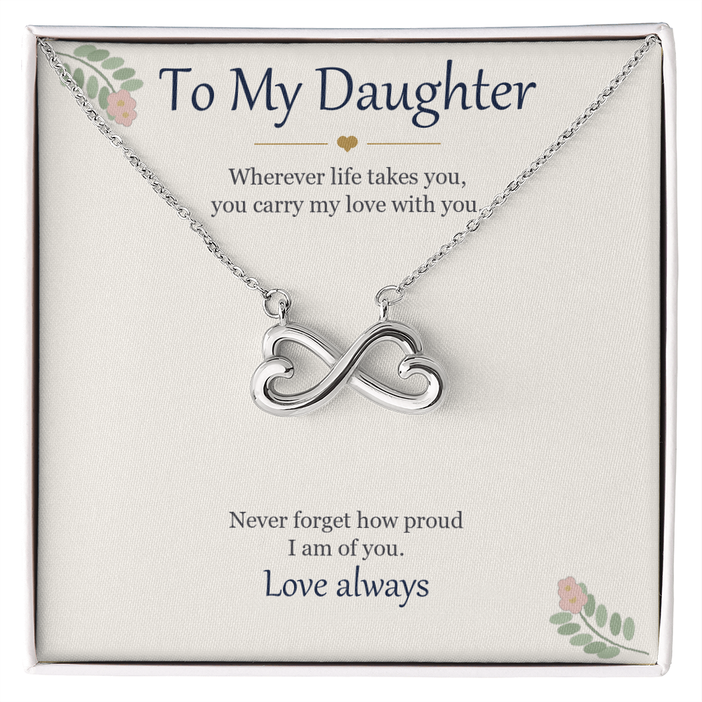 Infinity heart necklace in white gold finish on a cream To My Daughter message card